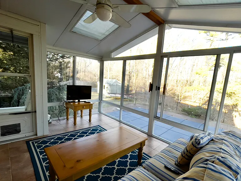 View of pool, yard, and nature from Sun Room #1