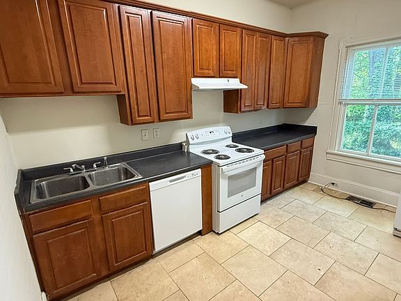 Large Kitchen with New Dishwasher and New Stove. Refrigerator.