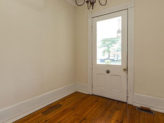 Front door view the hallway service both units.