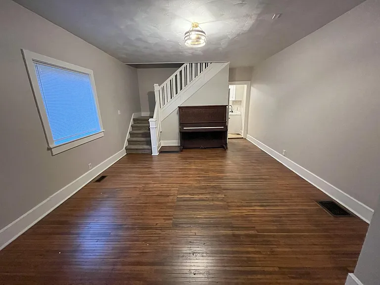 Large dining room space with piano (in-tune).
