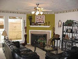 Spacious den w/corner freplace