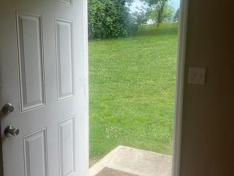 Back door with privacy walls between each unit.