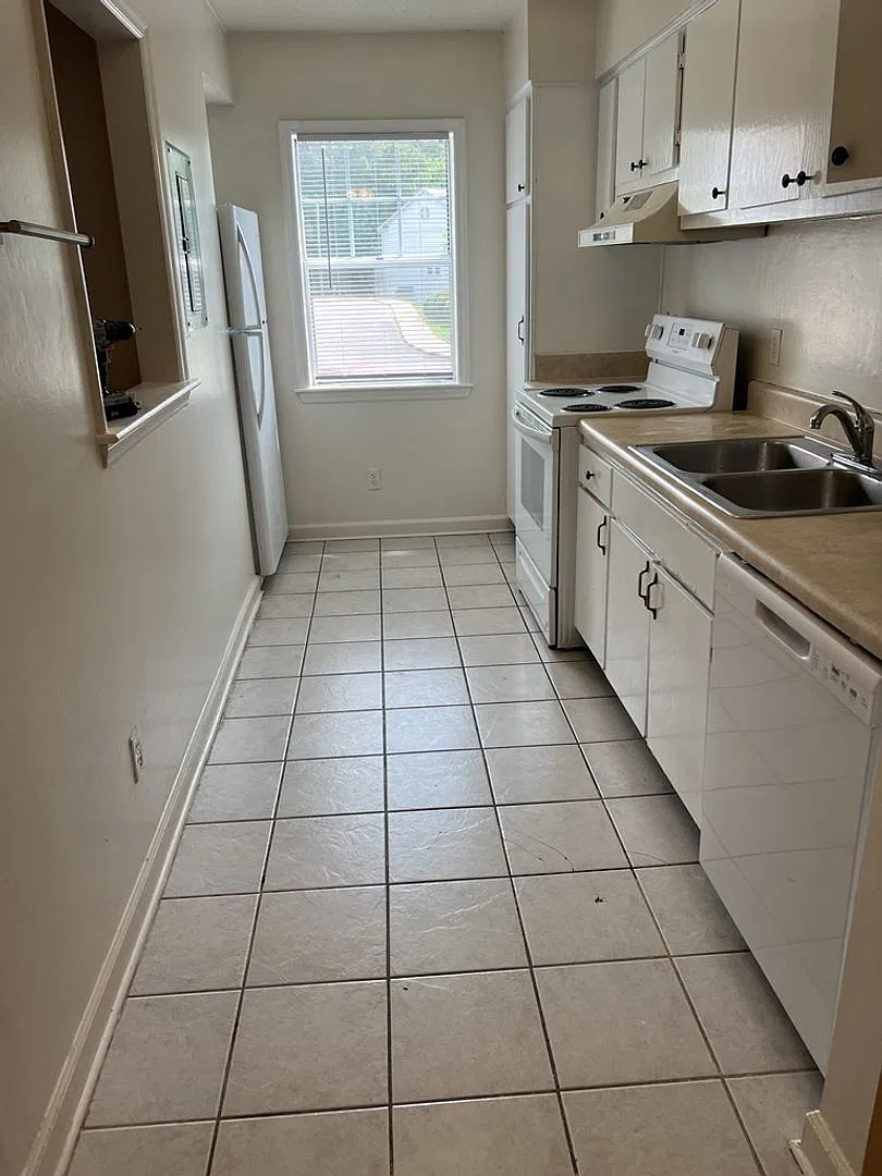 Don't miss this spacious and conveniently located 2-bedroom, 2.5-bath townhome in Raleigh! — Photo 1