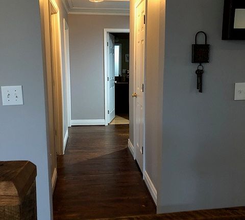 Hallway with large closet