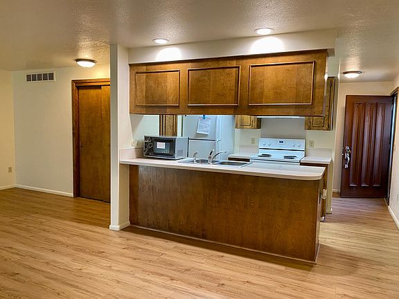 Kitchen opens nicely into living room area.