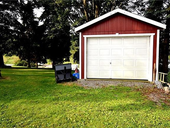 shed has door to store your riding lawnmower (Not included)