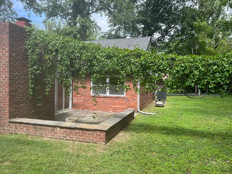 side elevation, stone patio