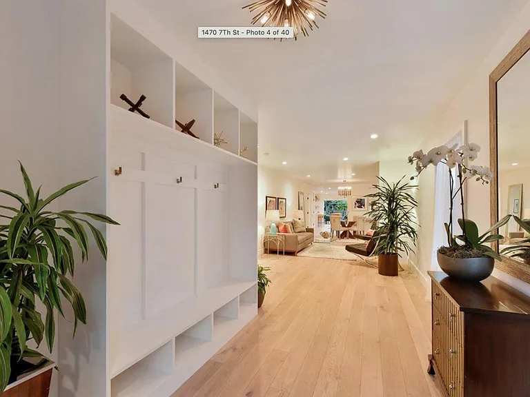 Open concept layout with living, dining and kitchen spaces