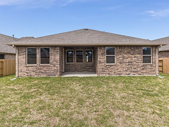 Come and see this spacious backyard with its beautiful covered patio. There is plenty of room for t