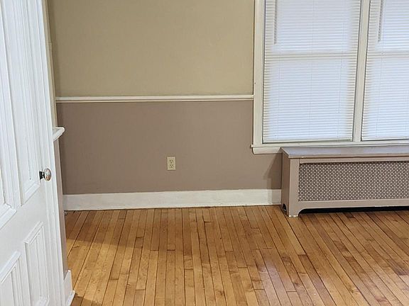 Dining Room with beautifully polished hardwood floors