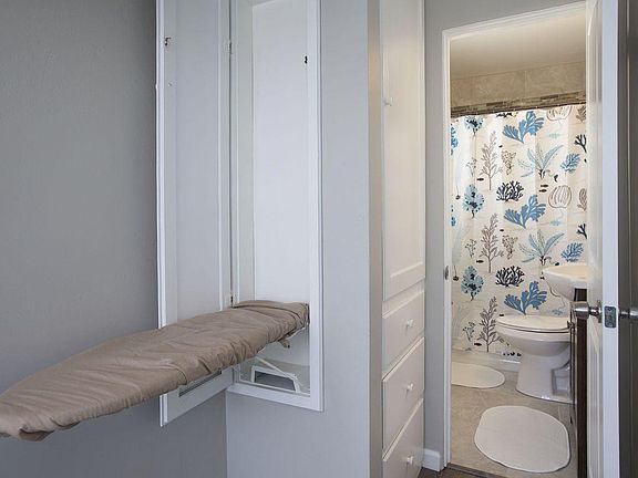 Easy access iron board