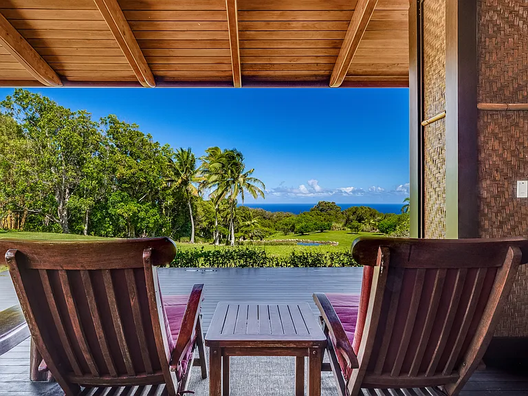 Kitchen deck has seating and outdoor table for 6-8 people