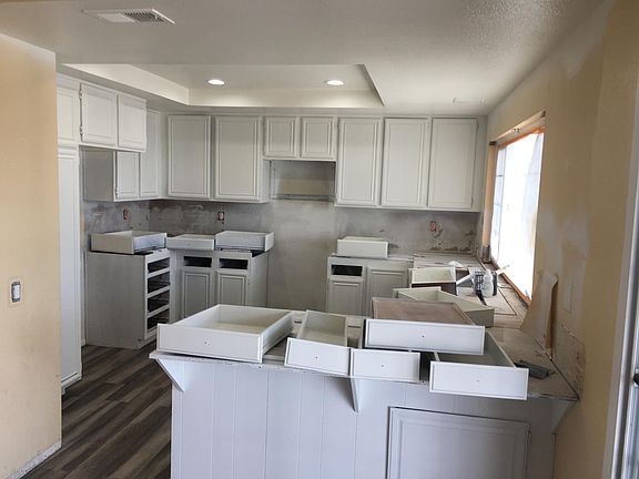 The kitchen update will be completed the week of January 4th. New counters and a new microwave and sink are being installed. There will be a stainless steel refrigerator included.