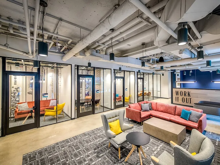 Co-working lounge with private study pods and conference room