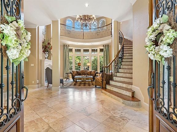 With double doors with iron accents, the grand entry will "wow" your guests every time!