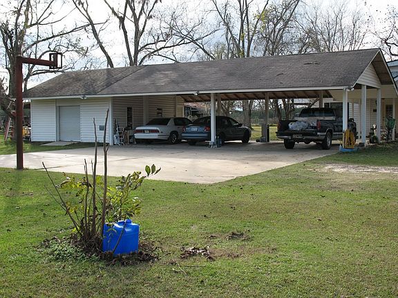 Carport w/attached workshop