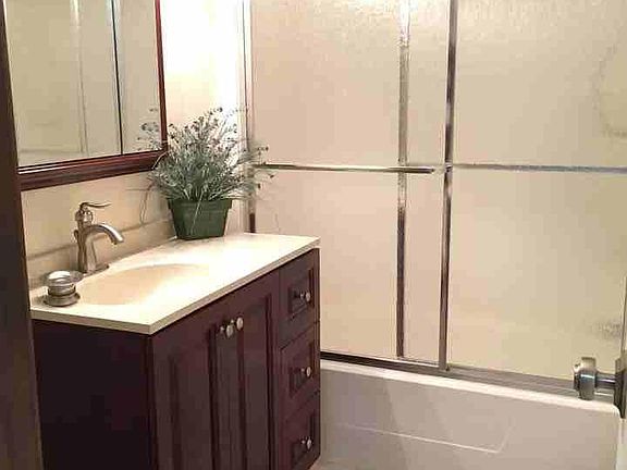 Main bathroom with shower doors