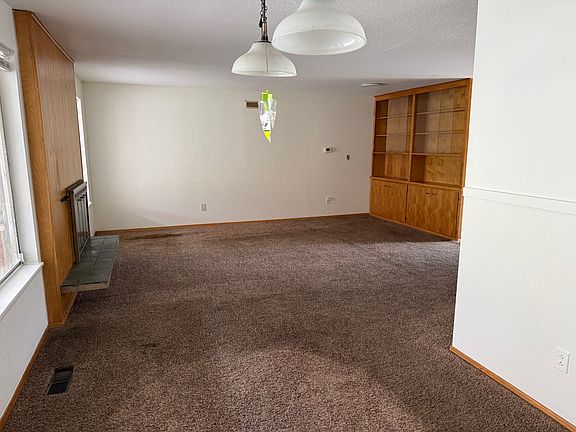 Cozy family room with fireplace and built-in storage