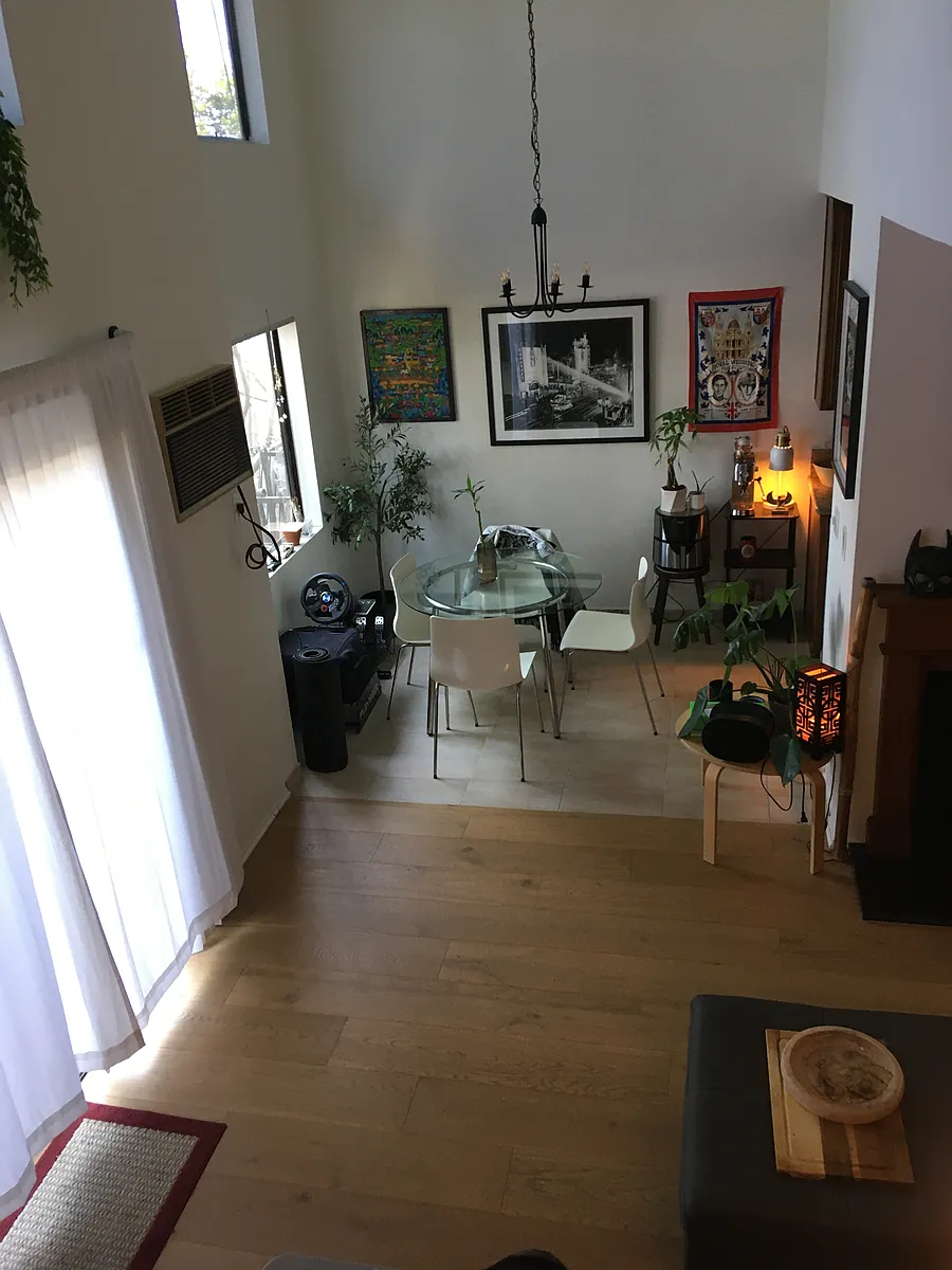 two story high dining area and living room give apartment spacious feeling - 3717 Vinton Ave #204