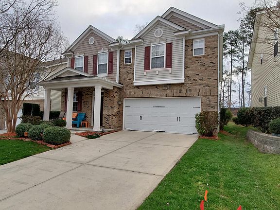 Two Car Garage with large flat driveway