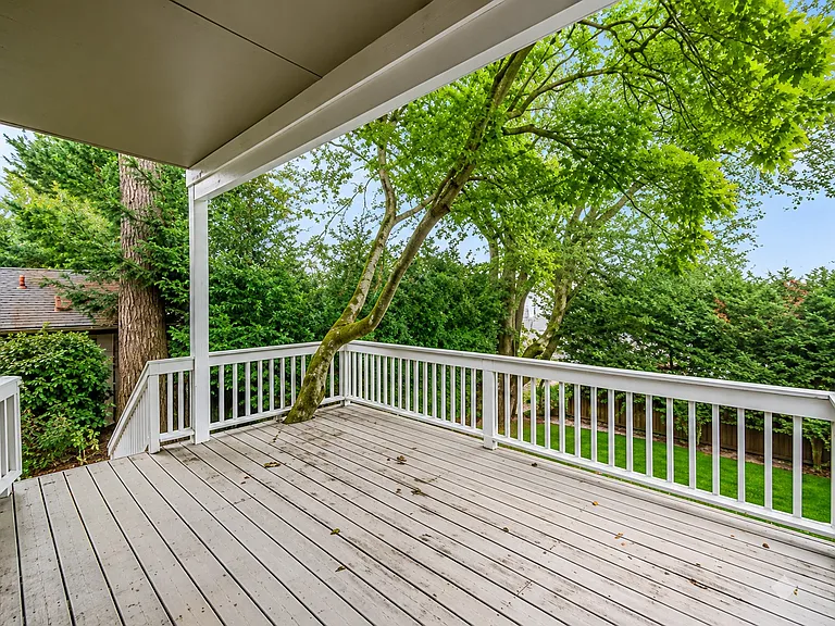 Back deck with large fenced yard
