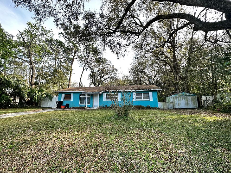 Large trees provide plenty of shade to keep the house cool
