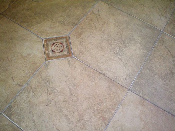 Detail of Custom 16" Ceramic Tile Floors with Inlays