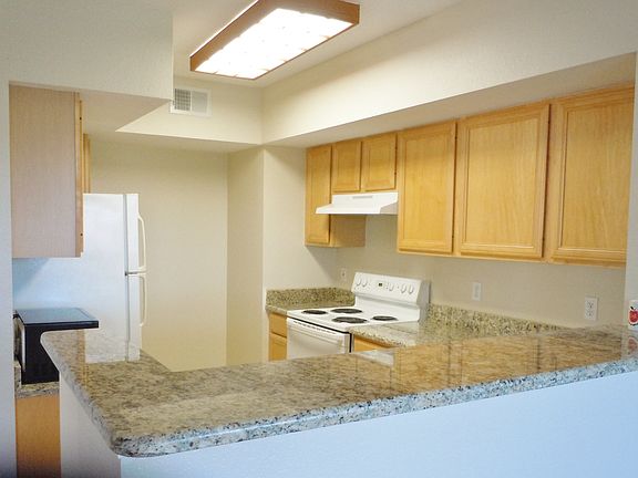 All granite kitchen and breakfast bar