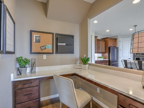 The Pulte Planning Center R is a space inspired by the consumer and serves as a bill paying, chargi