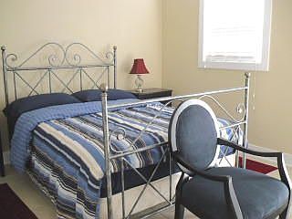The bedroom has double closet, balcony 