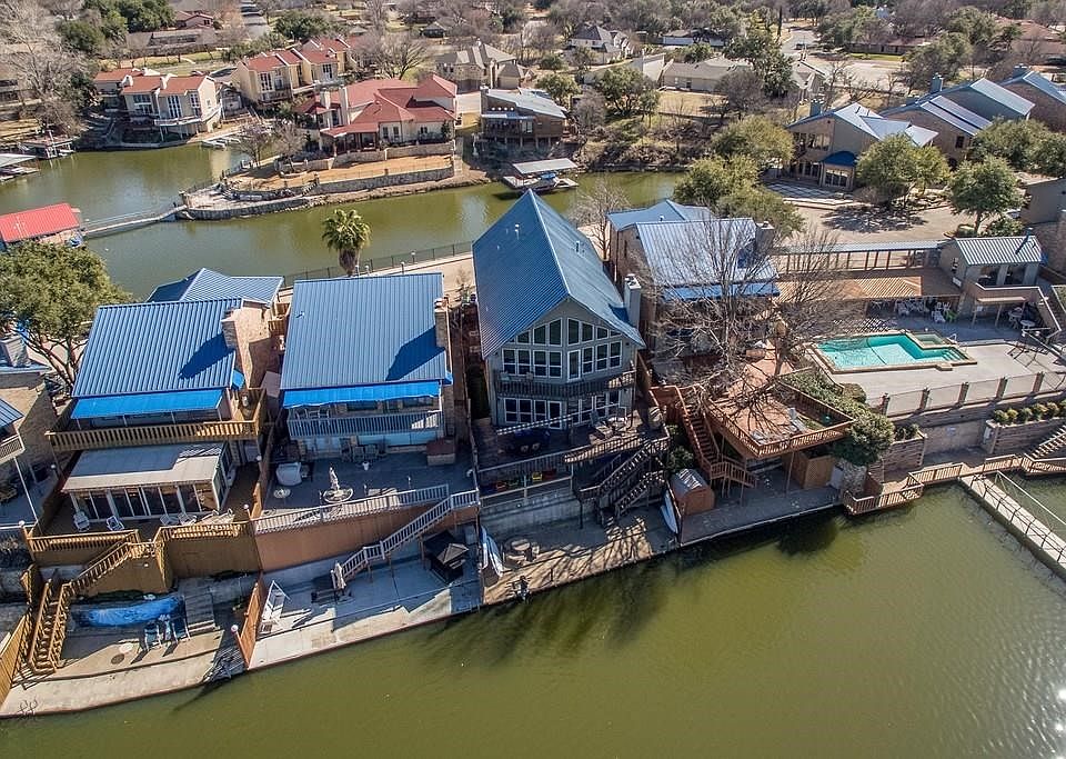 BEAUTIFUL lake front home with its own boat slip!