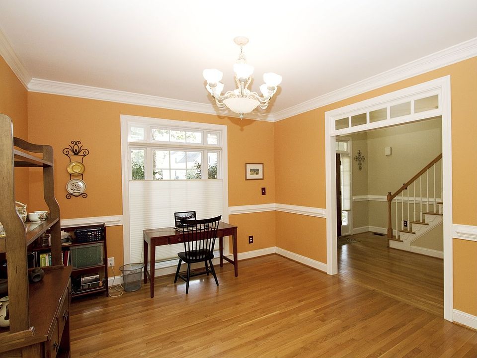 Currently used as a study, this dining room could serve a lrg gathering.