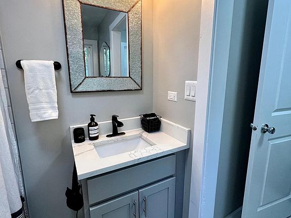 Updated bathroom with tub/shower combo