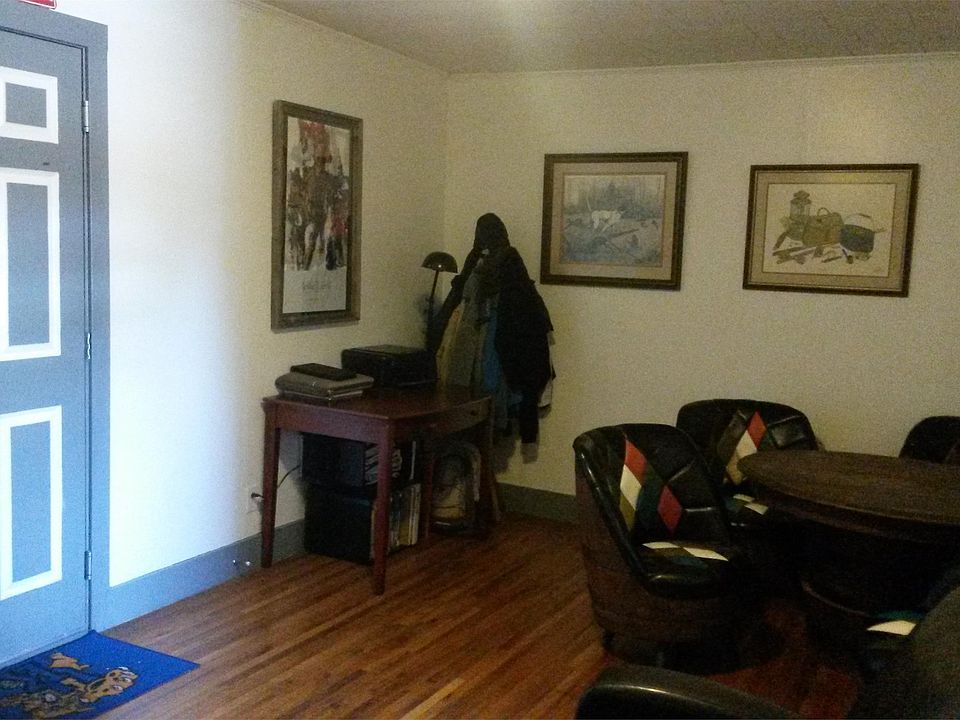 Spacious living room large enough for a desk or dining table.