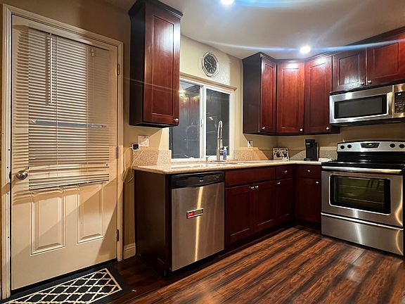 More of the kitchen area and door to patio area.