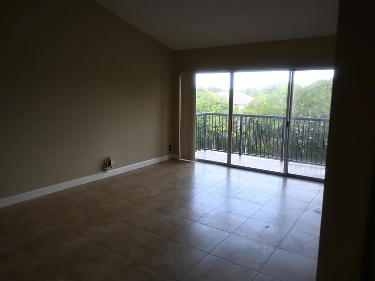 8721 Wiles Rd #305 — Photo 48