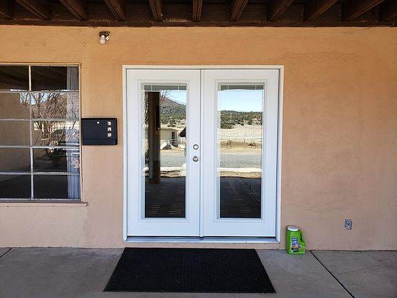 French doors entry way. French doors have built in blinds.