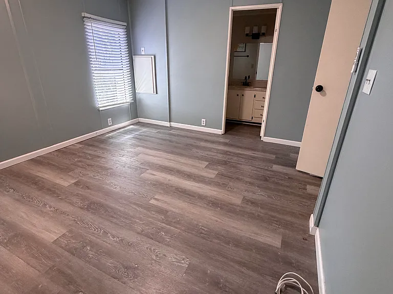 Master bedroom with ensuite bath and walk-in closet