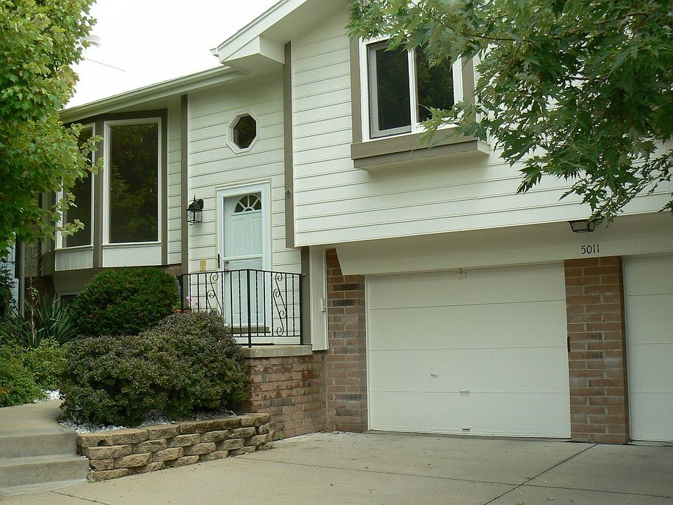 lots of curb appeal and shade from trees-painted in 2009.