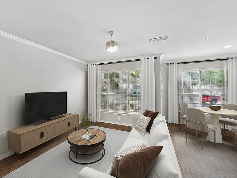 Classic Package II living and dining area with hard surface flooring (select homes)