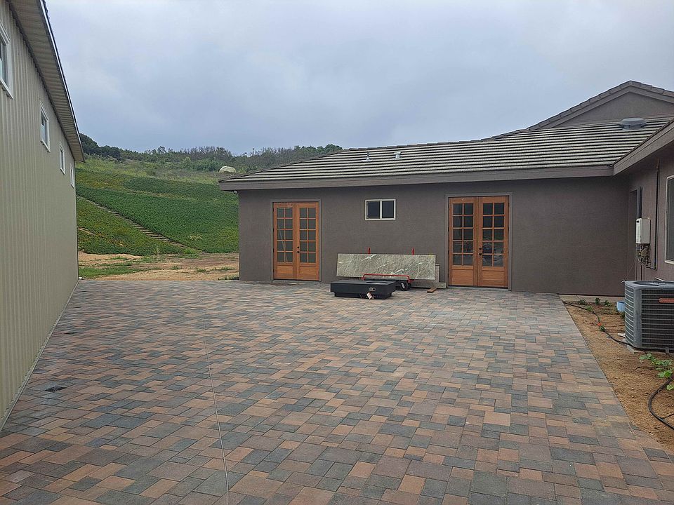 entrances and private patio area.