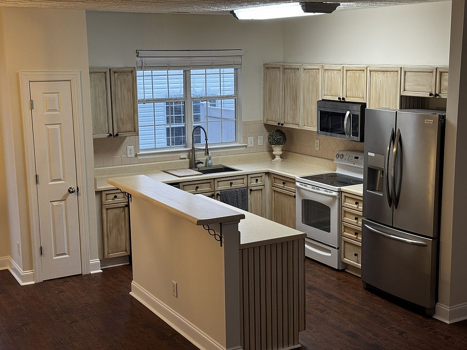 Open plan kitchen, with high top bar seating area