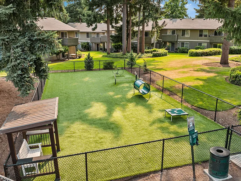 Enjoy our community dog park, complete with play equipment and seating.