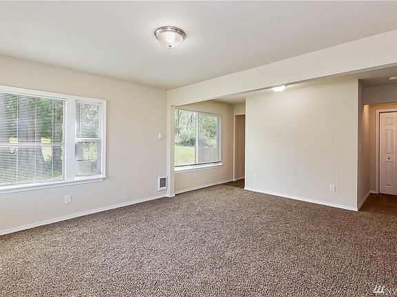 New paint carpet doors, windows, lighting....Large living area!