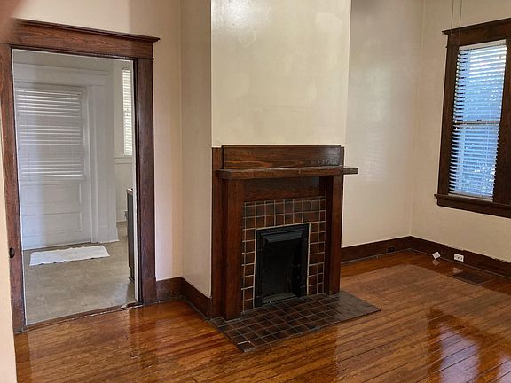Living room view into kitchen.