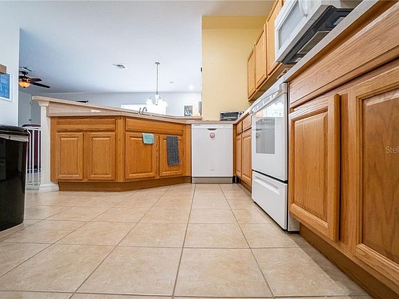 5th image of 4884 Battaglia Blvd