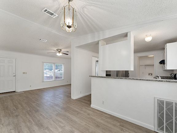 Kitchen bar and living area from dining area