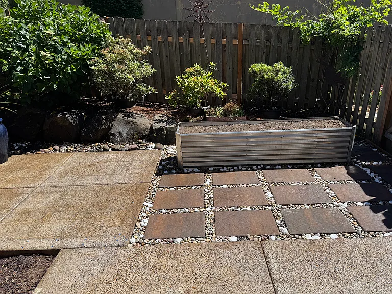 backyard with raised garden bed