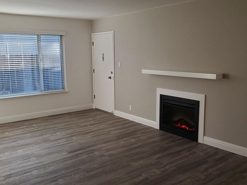 Living Room with Electric Fireplace / Heater