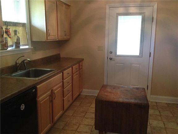 Kitchen redone 6 years ago. Tile floor. Appliances included